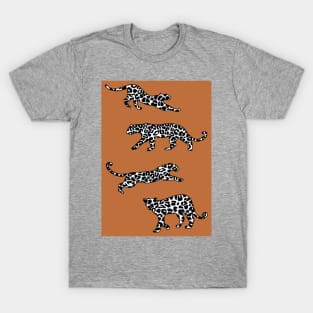 Leopard Shapes Pattern, Black and White, on Burnt Orange T-Shirt